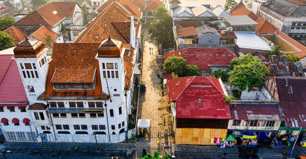 Breathtaking aerial shot of Jakarta's old town, showcasing traditional architecture under a clear morning sky.